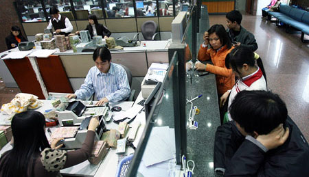 Sáp nhập ngân hàng: Chuyện đâu nặng nề