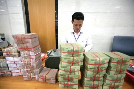 Sẽ để cho VND lên giá
