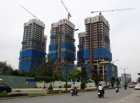 Nhà đất Hà Nội, Sài Gòn rục rịch giảm giá vì đói vốn