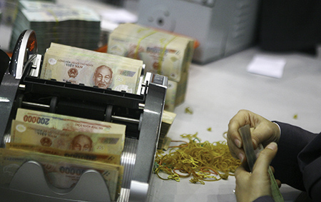 Có nên áp trần lãi suất cho vay ngân hàng quốc doanh?