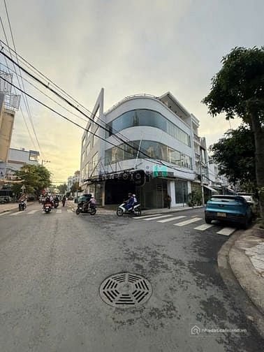 Bán nhà riêng: HHMG1%-Căn góc MT 10 Huỳnh Thị Đồng-Nhà Bè. DT 13x26m, hầm 3 lầu