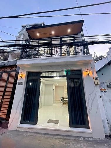 Bán nhà riêng: Nhà phố mặt tiền hẻm 96 Tân Mỹ, ngay trường Đại Học Marketing Quậ