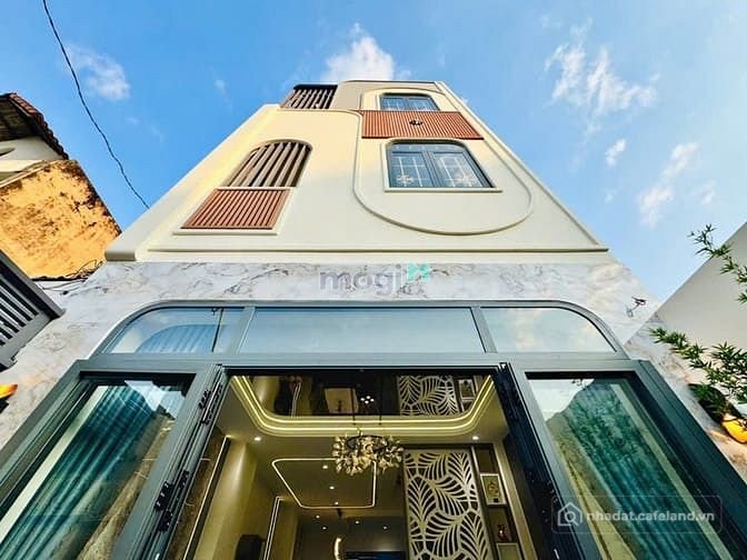 Bán nhà riêng: Bán nhà xây mới hẻm xe hơi Quang Trung, P.8, 4,1 x 14, giá 6.75 t