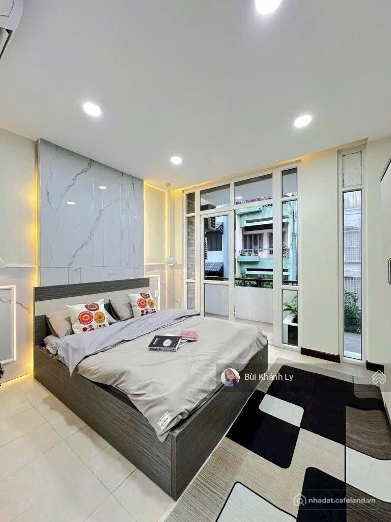 Bán nhà riêng: Nhà 5 tầng hẻm xe hơi hồ văn huê 100m 7 phòng khép kín khu kinh d