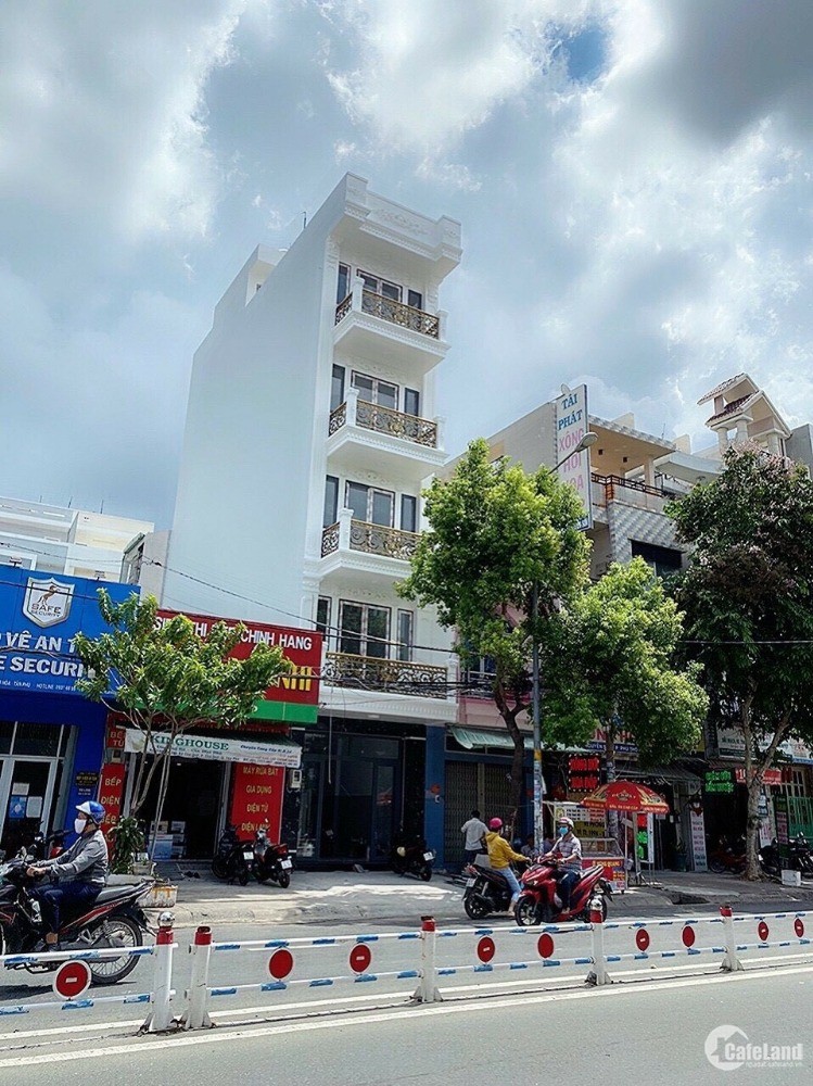 Bán nhà MTKD Nguyễn Sơn Q.Tân Phú DT 4x13.5 Đúc 4 lầu st nhà mới Gía 11.8 tỷ TL