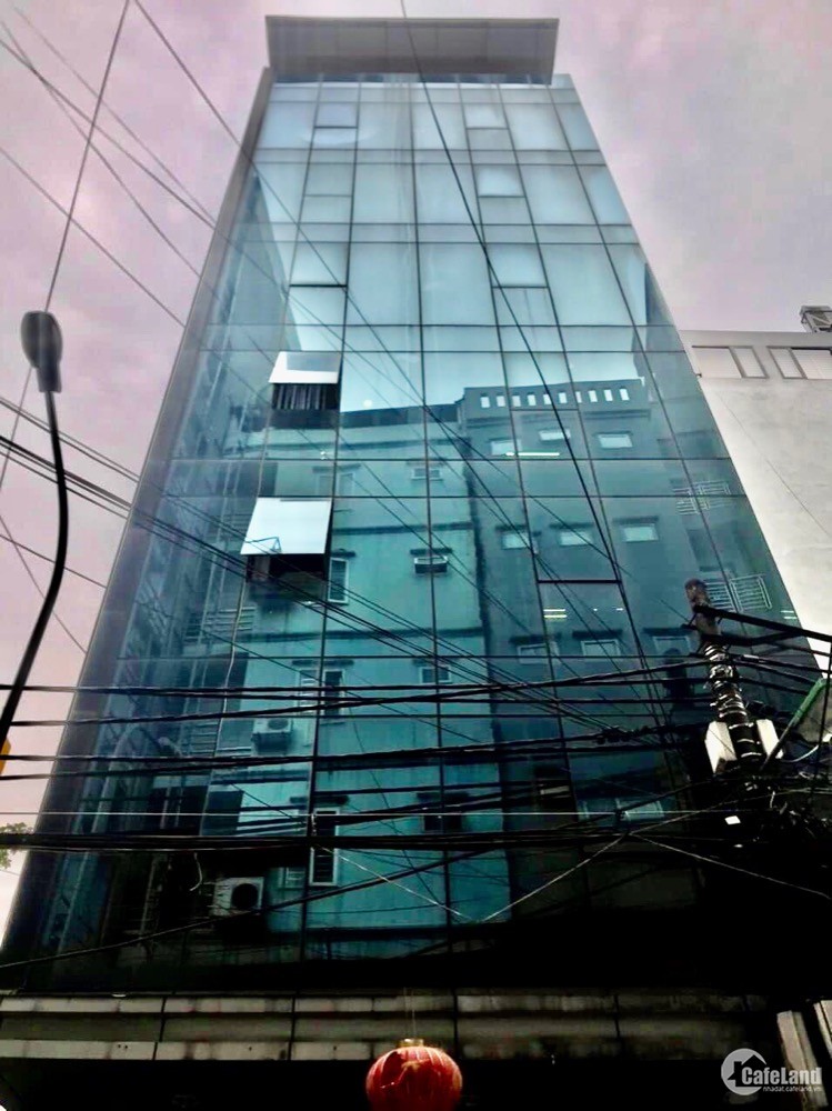 Toà nhà 8 tầng thang máy Lê Đức Thọ,kinh doanh sầm uất ô tô tráng