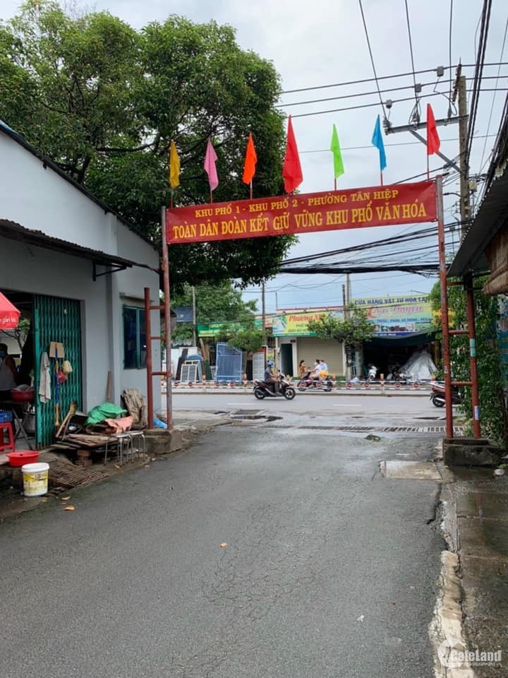 Bán lô đất mặt tiền đường liên khu phố 1-2, Tân Hiệp, 1 xẹc đường Nguyễn Ái Quốc
