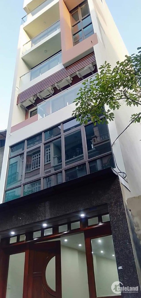 Siêu phẩm tòa nhà ở phố Lạc Long Quân, 65m2, 7T thang máy. Oto tránh, kinh doanh