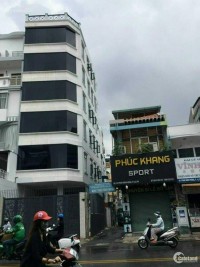 Kẹt tiền bán gấp nhà mặt tiền đường Nguyễn Văn Cừ, Q1. DT: 5x12m,7 tầng