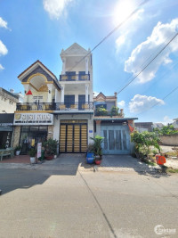 Cần bán nhà 2 lầu ngay đường Nguyễn An Ninh gần chợ Dĩ An 1 đang kinh doanh 2 MT