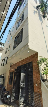 Nhà thang máy 6 tầng Hoàng Đạo Thành, 30m2, mặt tiền 5,2m, ngõ thông 4m ô tô