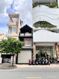 Bán Nhà Mặt Tiền Đường Tân Sơn Nhì dt 4.6x23.5m (1 lầu st) GIá 20.7 tỷ TL