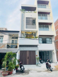 Bán nhà 4 tầng có thang máy mới xây quận 7