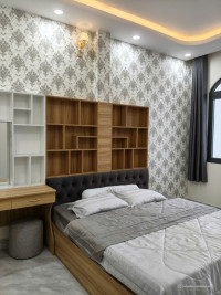 Nhà 1 trệt 2 lầu 12x8,5 Xây dựng 8x8,5 BTCT 4PN 4WC, có Gara Ô tô riêng