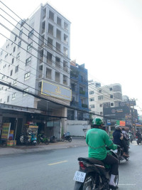 TÒA NHÀ HẦM + 9 TẦNG – 90F ÂU CƠ, P.14, Q. TÂN BÌNH