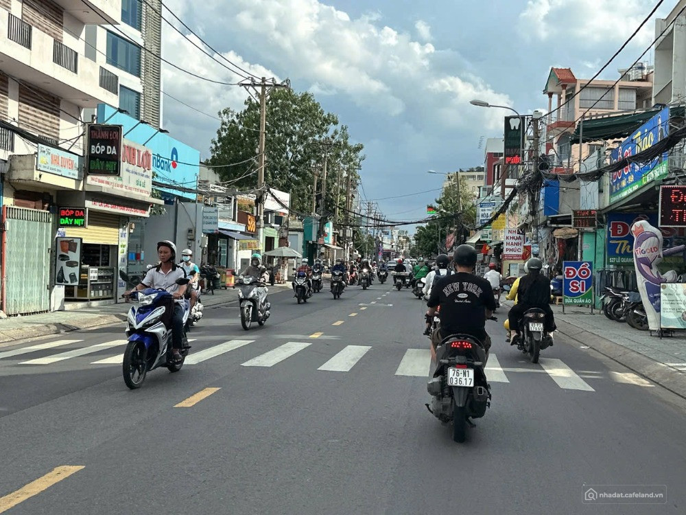 Bán MTKD Trần Bình Trọng BT ngang 13m 800m2 52 PN gần chợ HHT chỉ 103 tỷ