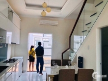 Bán nhanh nhà trệt lầu mặt tiền đường nhựa